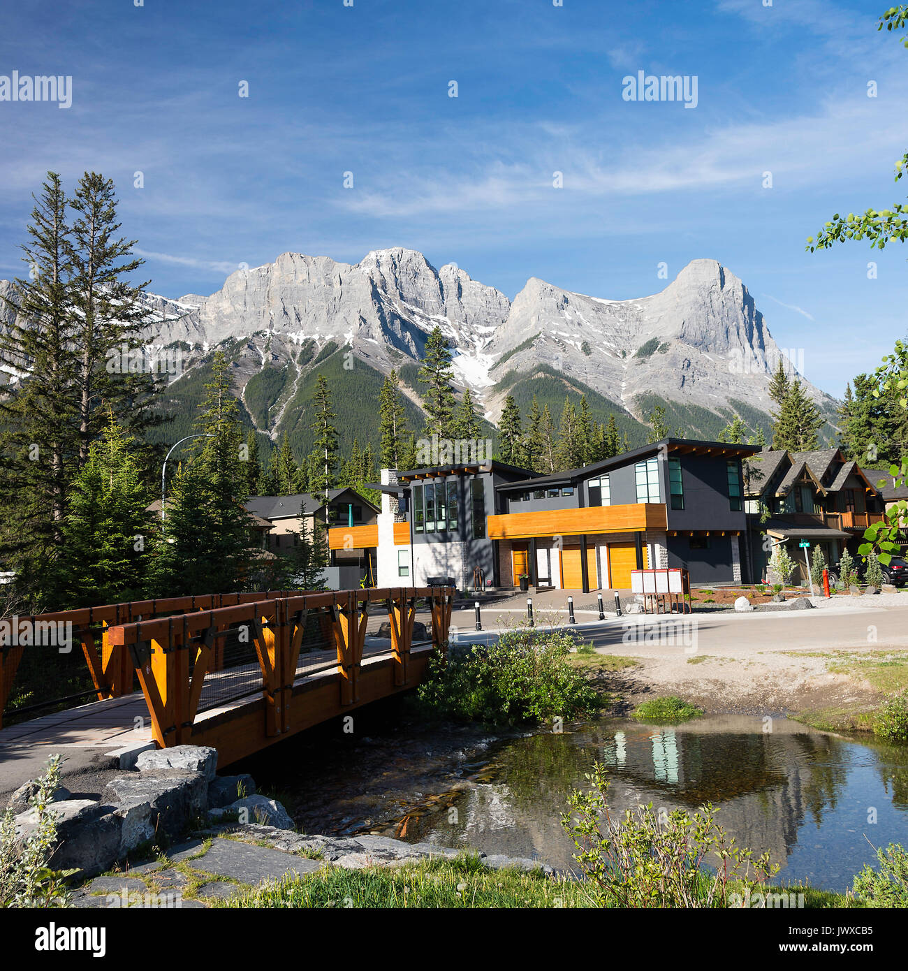 Beautiful Housing and Rocky Mountain Scenes and Pine Forest in Canmore Banff National Park Alberta Canada Stock Photo