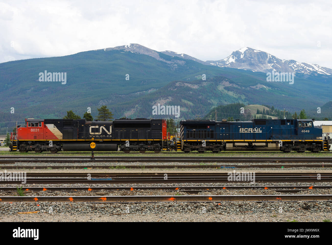 A Canadian National and BC Rail Diesel Railway Locomotives Parked in a Siding at Jasper Railway Station Alberta Canada Stock Photo