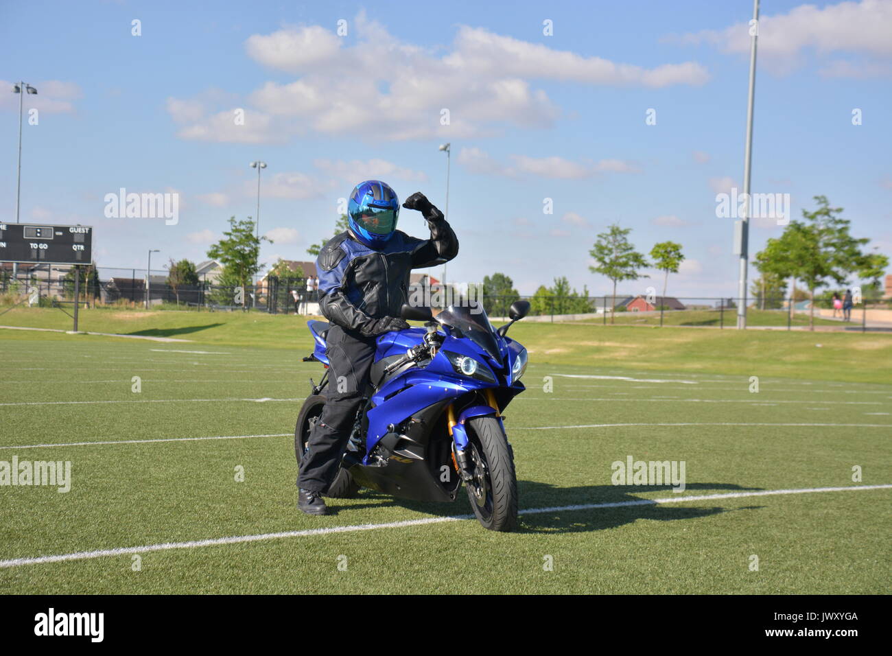 Rider On The Football Field Stock Photo Alamy