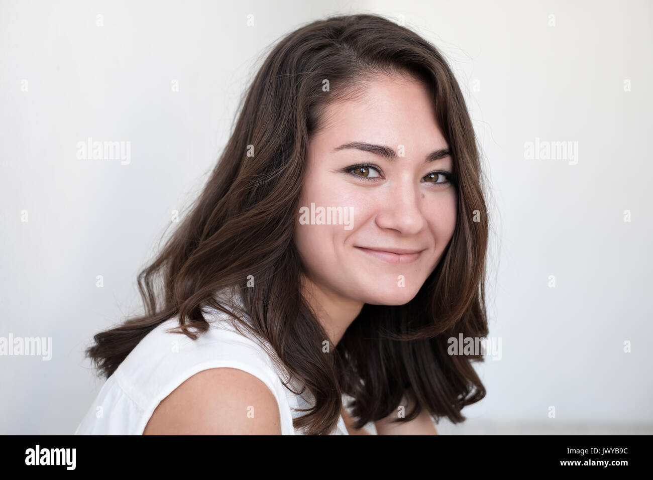 Teen girl portrait, over white background Stock Photo