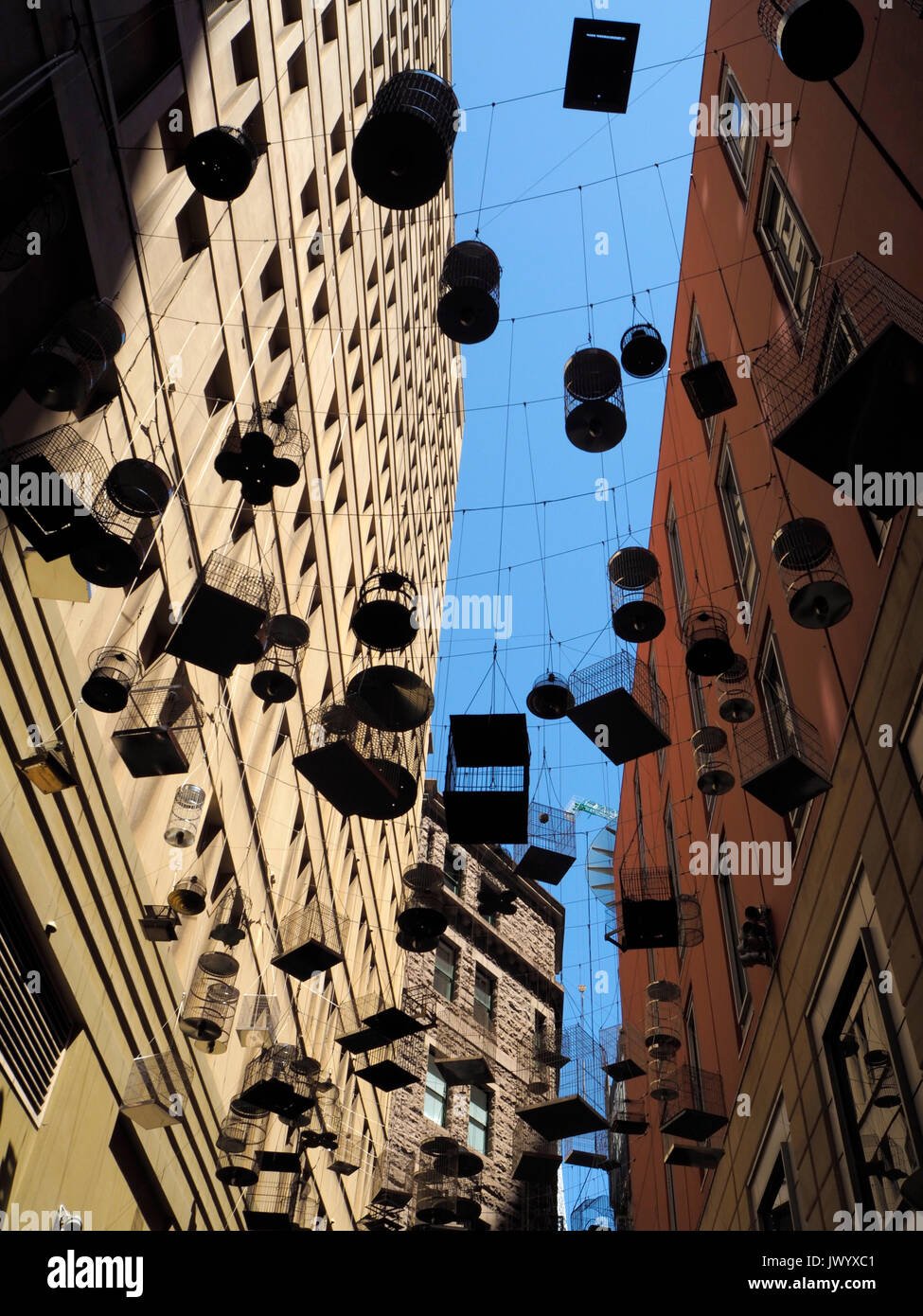 Hanging bird cages between Skyscrapers in Sydney, Australia Stock Photo