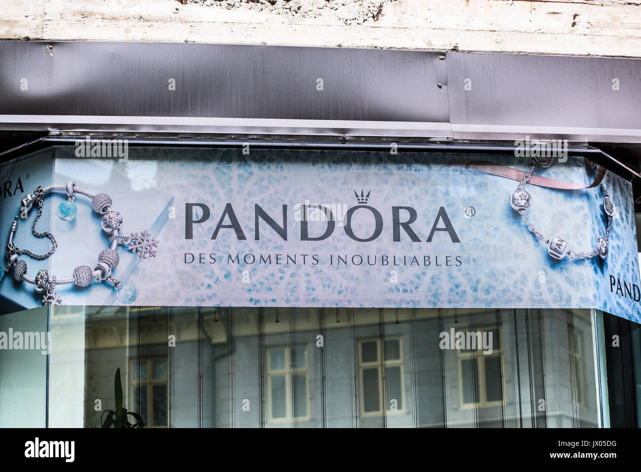 Quebec City, Canada - May 30, 2017: Pandora Jewelry store banner sign closeup by entrance of shop Stock Photo