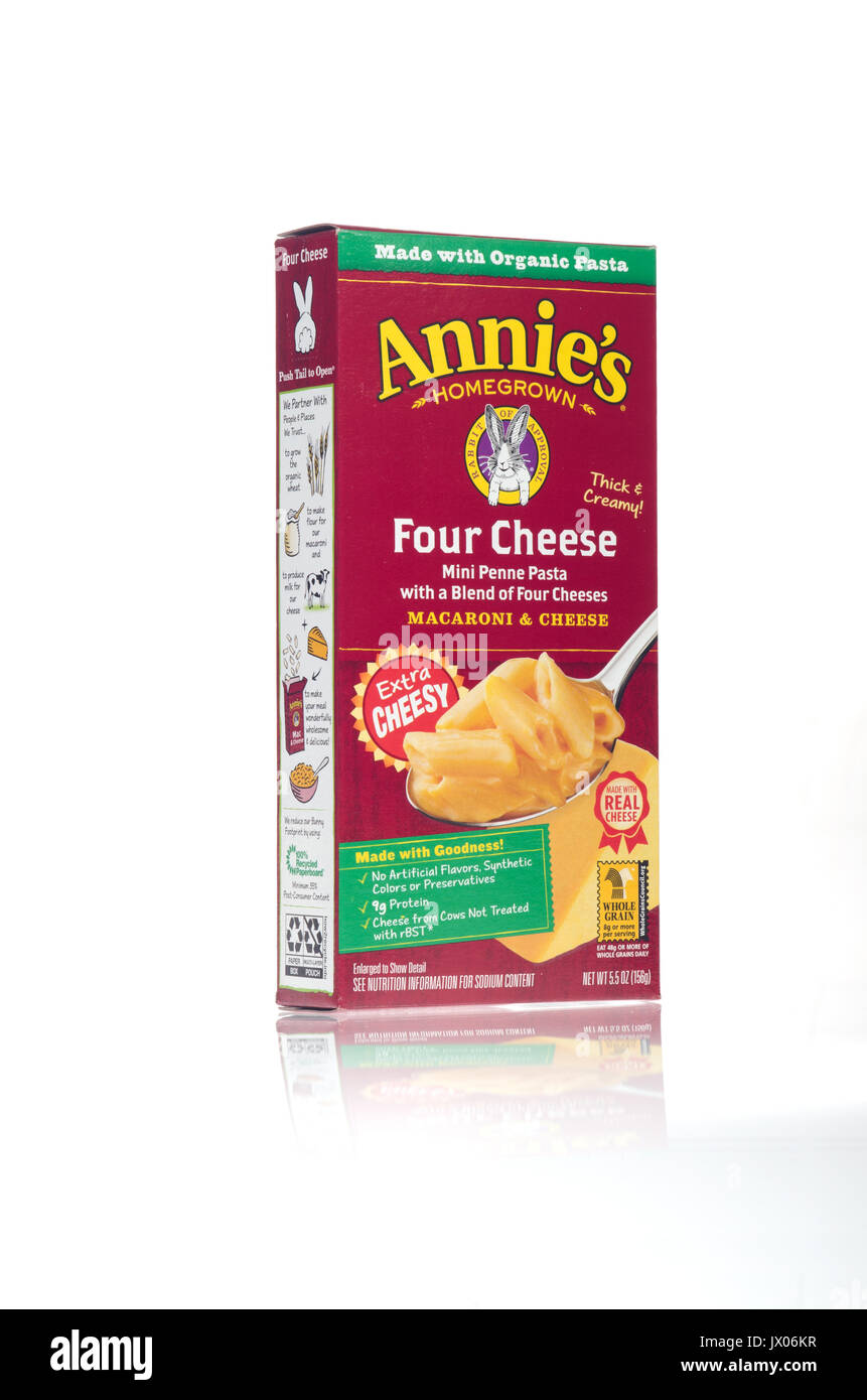 Unopened box of Annie’s Organic Pasta Mac and Cheese on white background isolate. USA Stock Photo