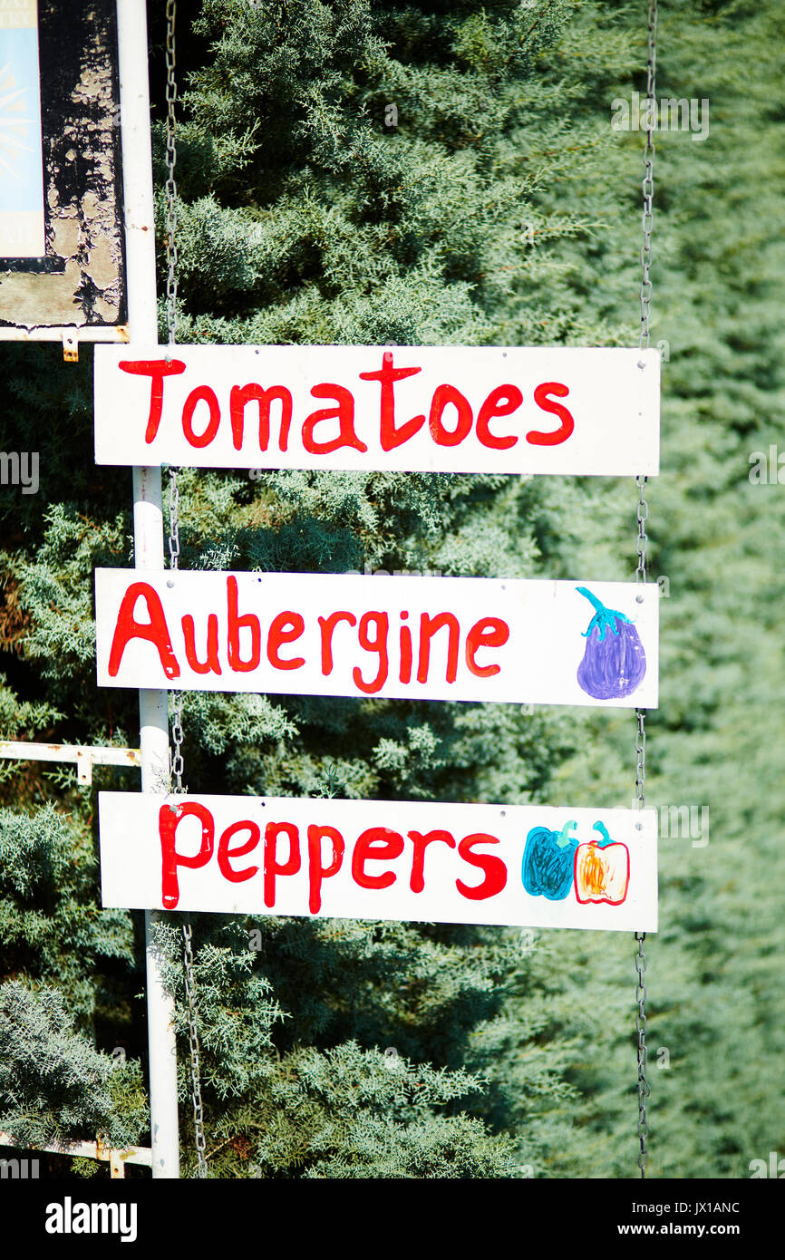 Fresh roadside produce sign Stock Photo