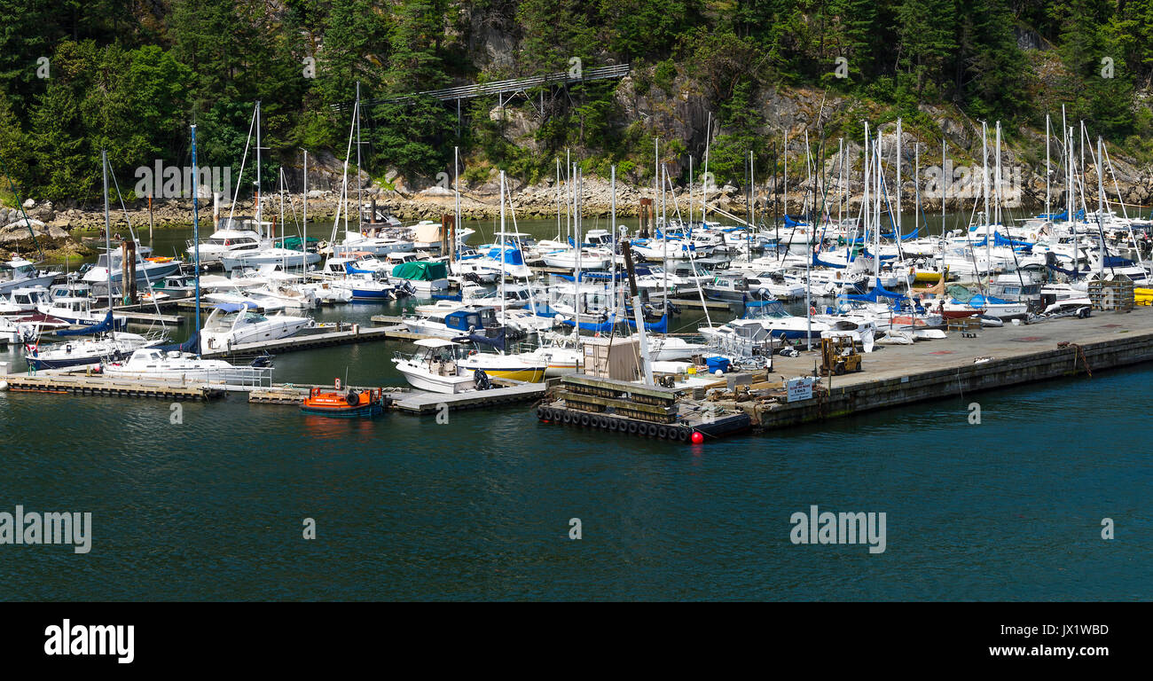 A Marina With Private Yachts ,Cabin Cruisers and Luxury Boats at Horseshoe Bay near BC Ferries Ferry Terminal in British Columbia Canada Stock Photo