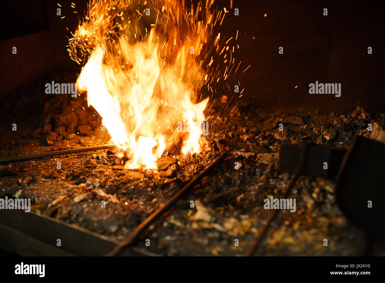 Blacksmith oven fire in workshop for metal heating Stock Photo