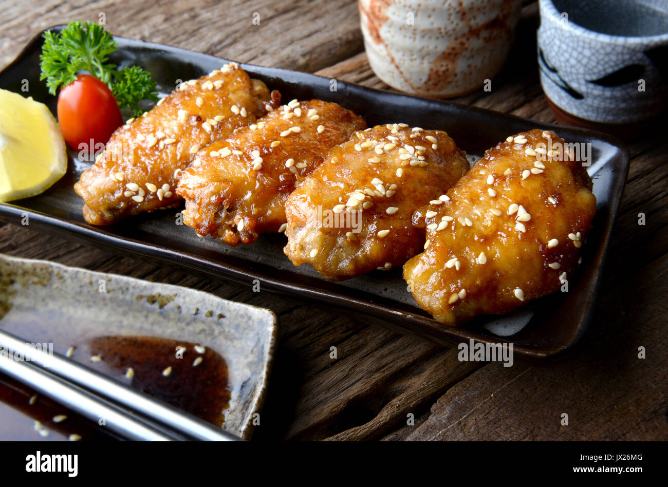 Fried chicken wing with spicy sauce in Japanese style or Tebasaki wing
