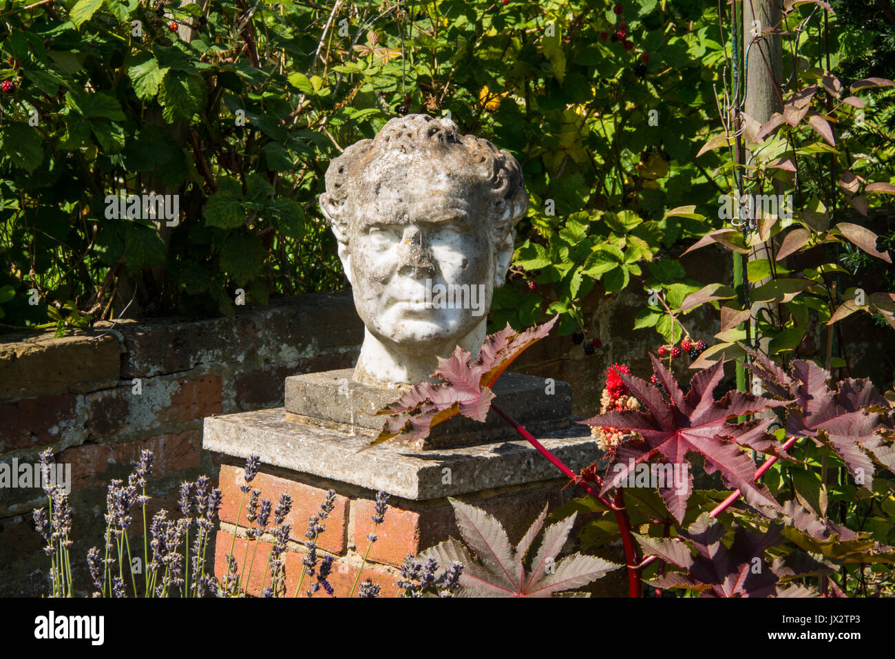 An Old Marble Head In An Urban Garden Stock Photo 153727339 Alamy