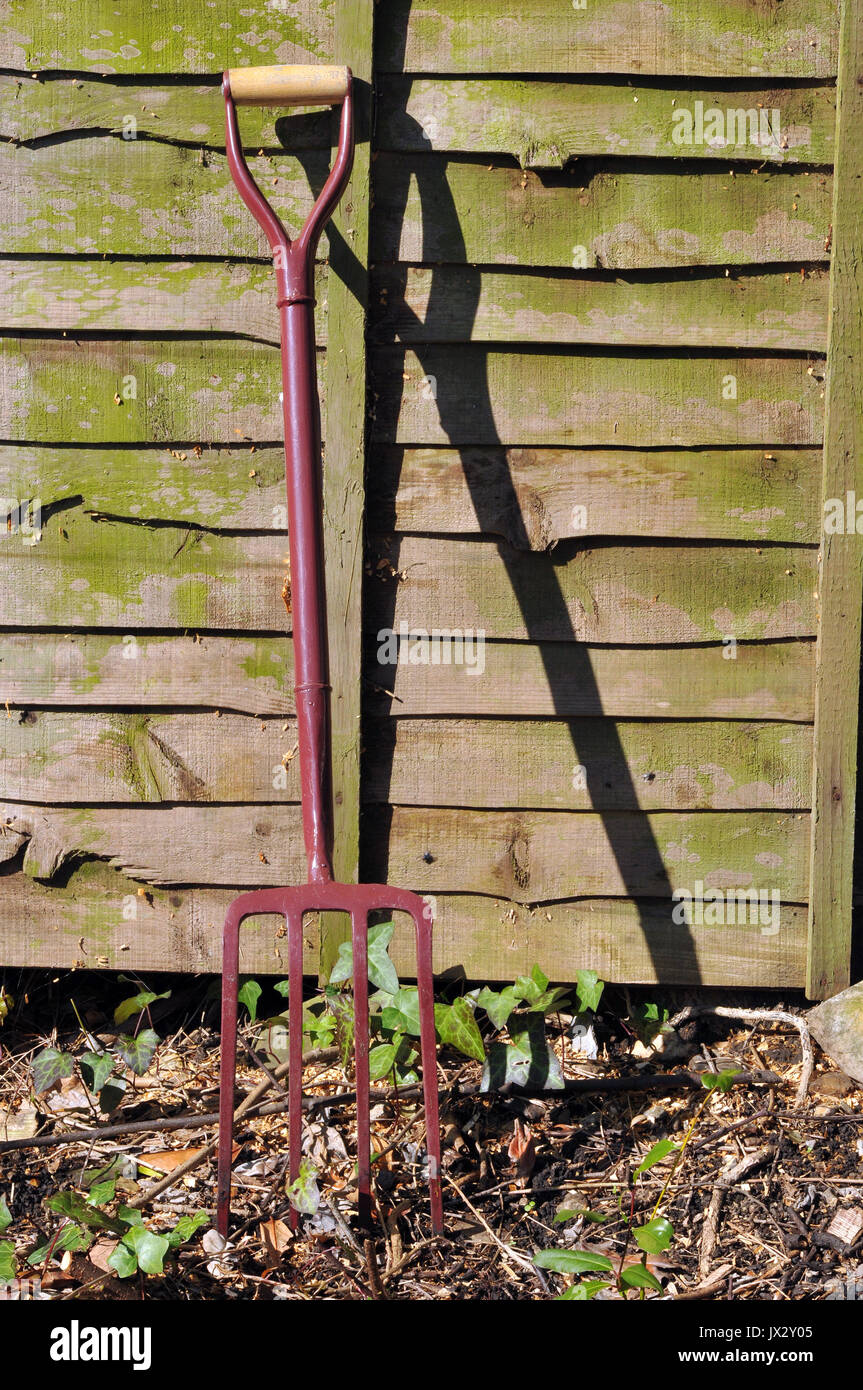 garden tools and axes choppers spades and forks to dig the garden and