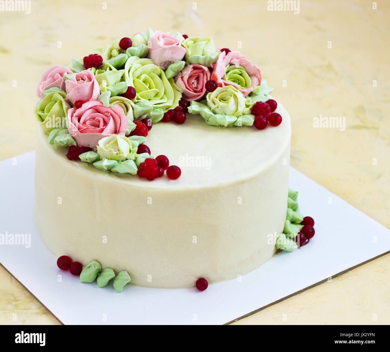 Birthday cake with flowers rose on light background Stock Photo - Alamy