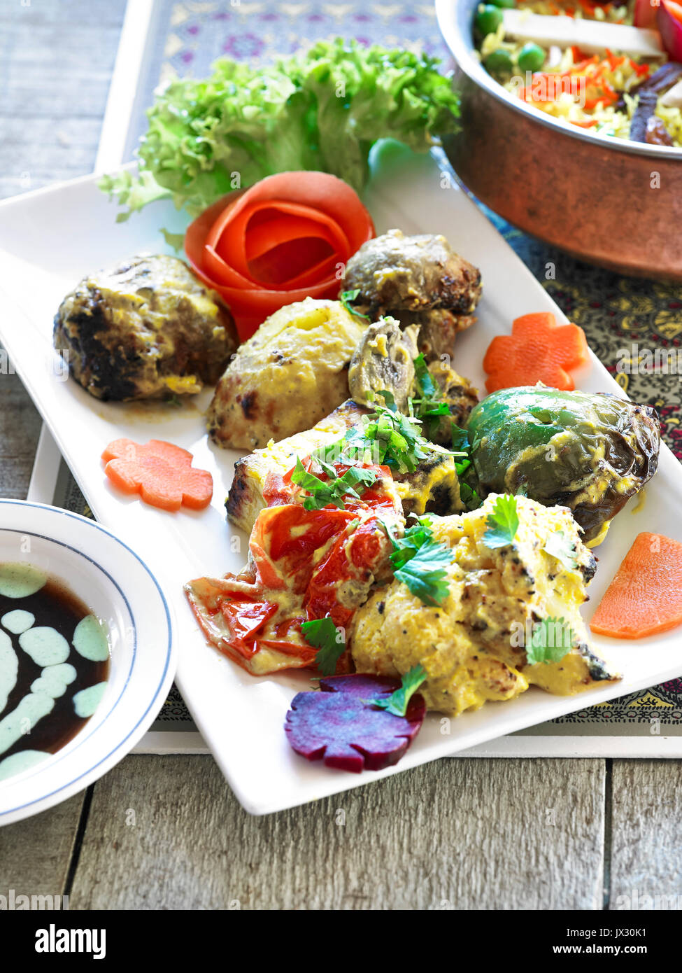 indian egg aubergine vegtable chicken dish Stock Photo Alamy