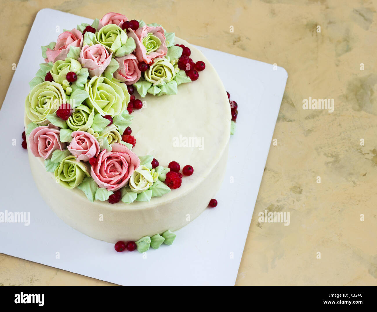 Birthday cake with flowers rose on light background Stock Photo - Alamy