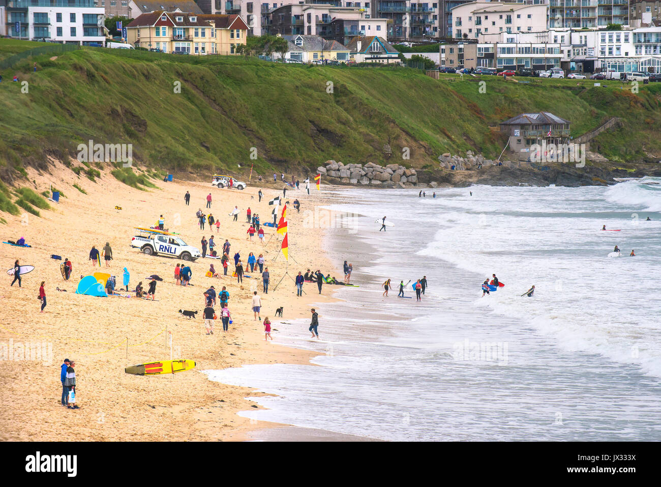 Holidaymakers enjoying themselves on Fistral Beach in Newquay, Cornwall. Stock Photo