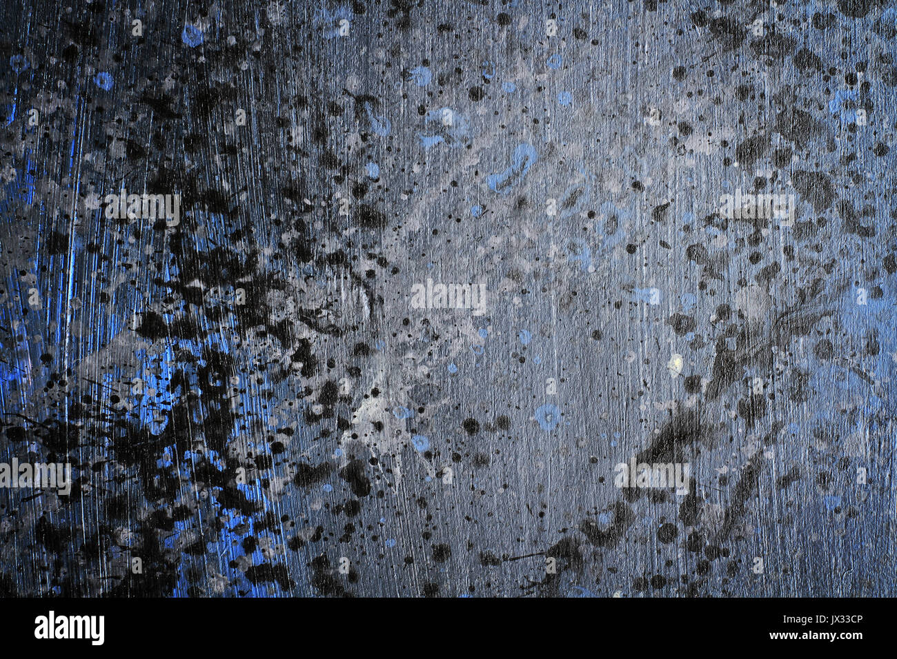 Hand painted splattered black, blue and grey wood grain texture background with acrylic paint splatter Stock Photo