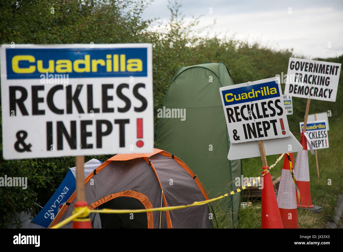 Anti-fracking  posters and tents outside the gates of Quadrilla's fracking site June 31st, Lancashire, United Kingdom. The struggle against fra Stock Photo