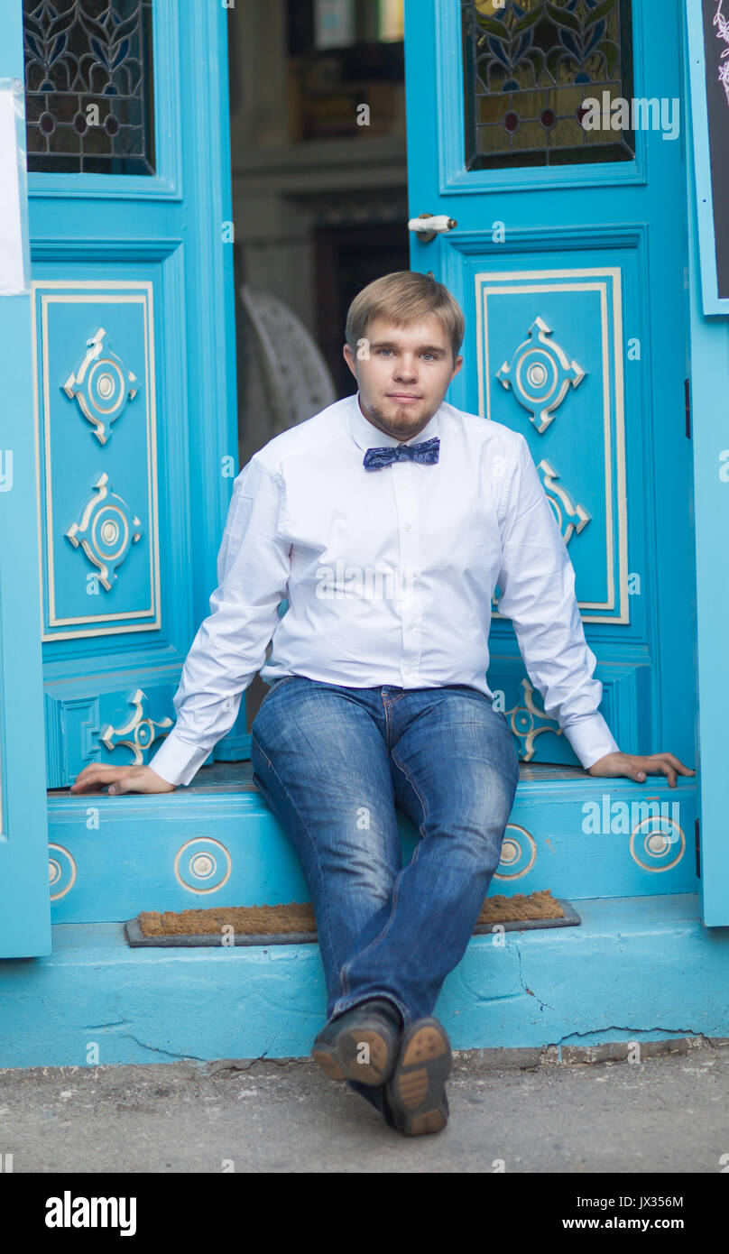 Young Handsome Man With Short Hair Wearing A Bow Tie And Posing In