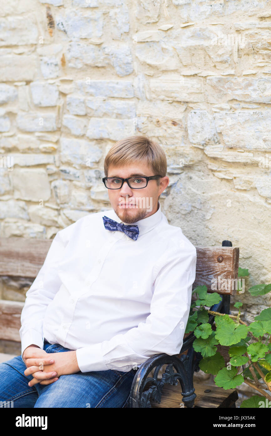 Young Handsome Man With Short Hair Wearing A Bow Tie And Posing In