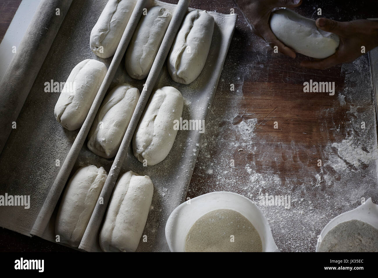 hand made rolls awaiting baking Stock Photo