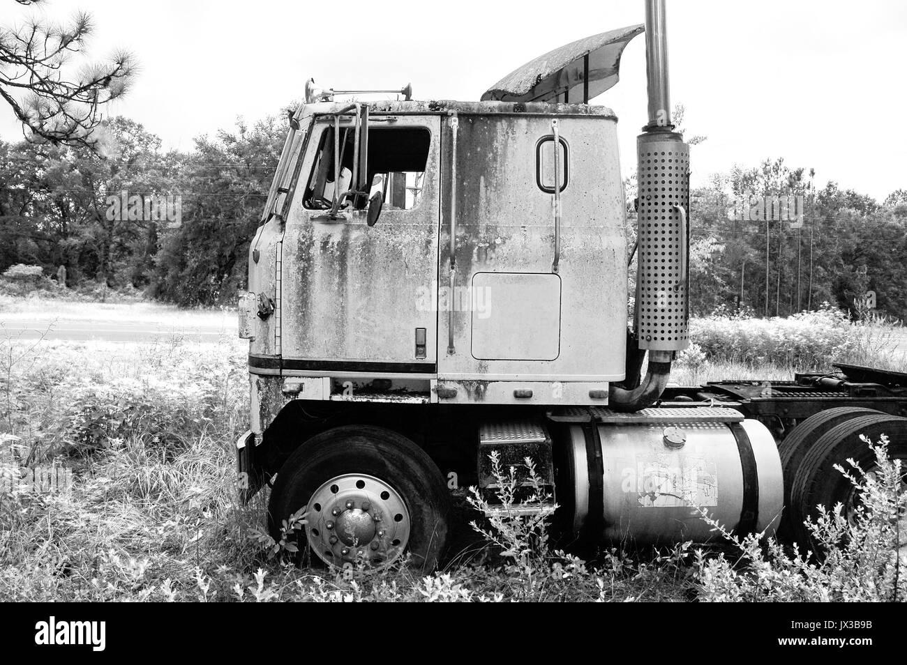 Abandoned tractor trailer cab in a rural area. Stock Photo