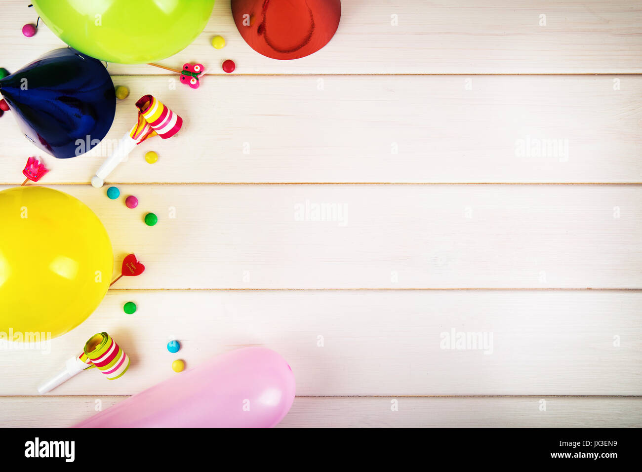 colorful birthday party items with copy space. top view Stock Photo