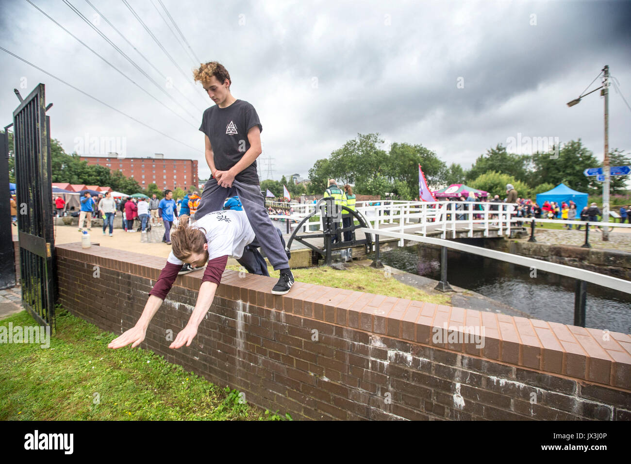 Boys and young men doing parkour Stock Photo