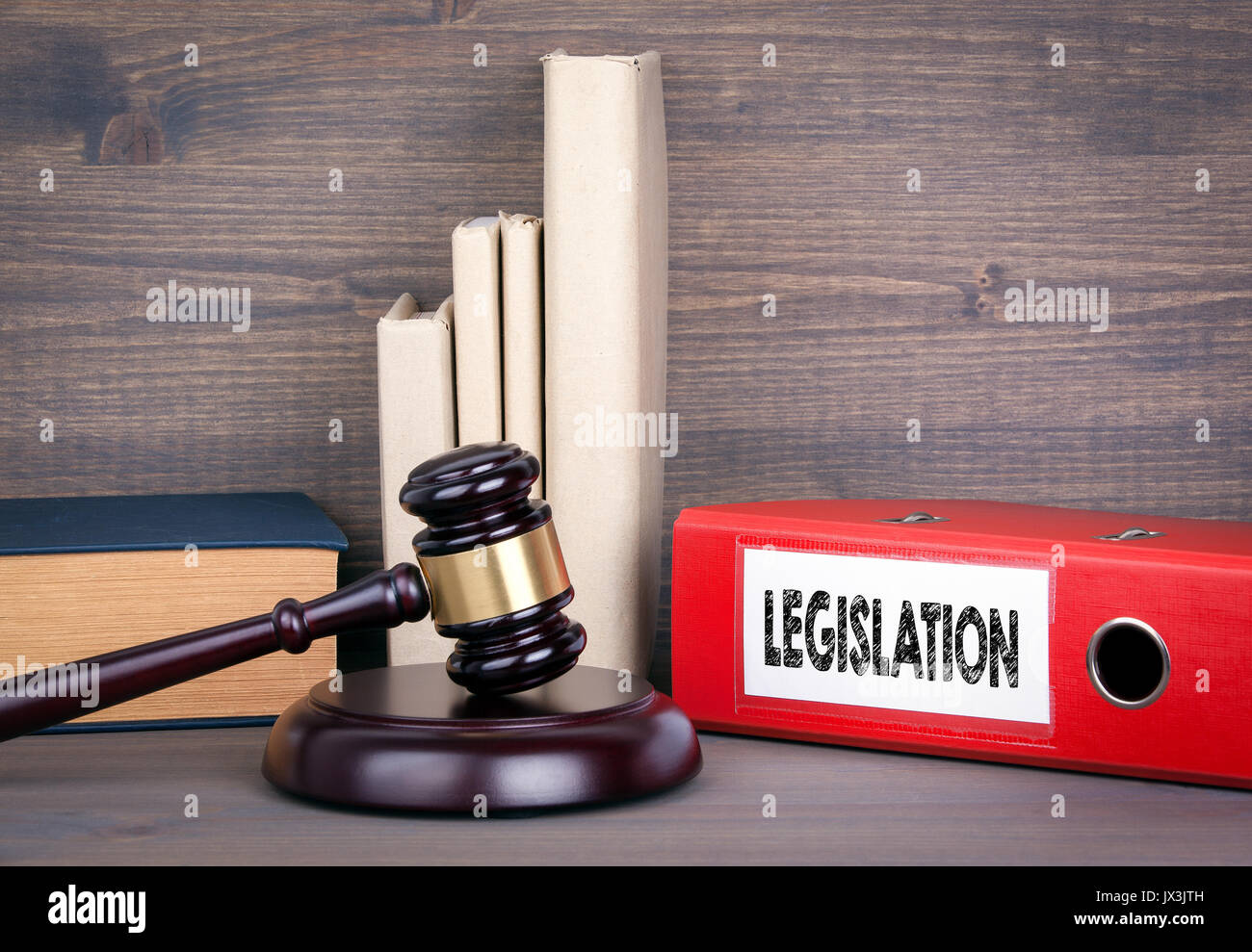 Legislation. Wooden gavel and books in background. Law and justice concept. Stock Photo
