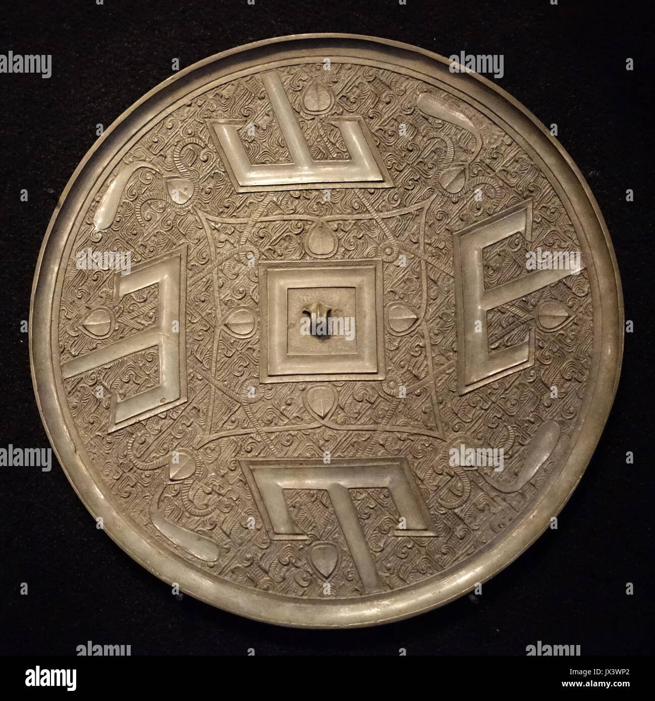Mirror with T shaped design, China, Warring States period, 475 221 BC), bronze   Hong Kong Museum of Art   DSC00705 Stock Photo