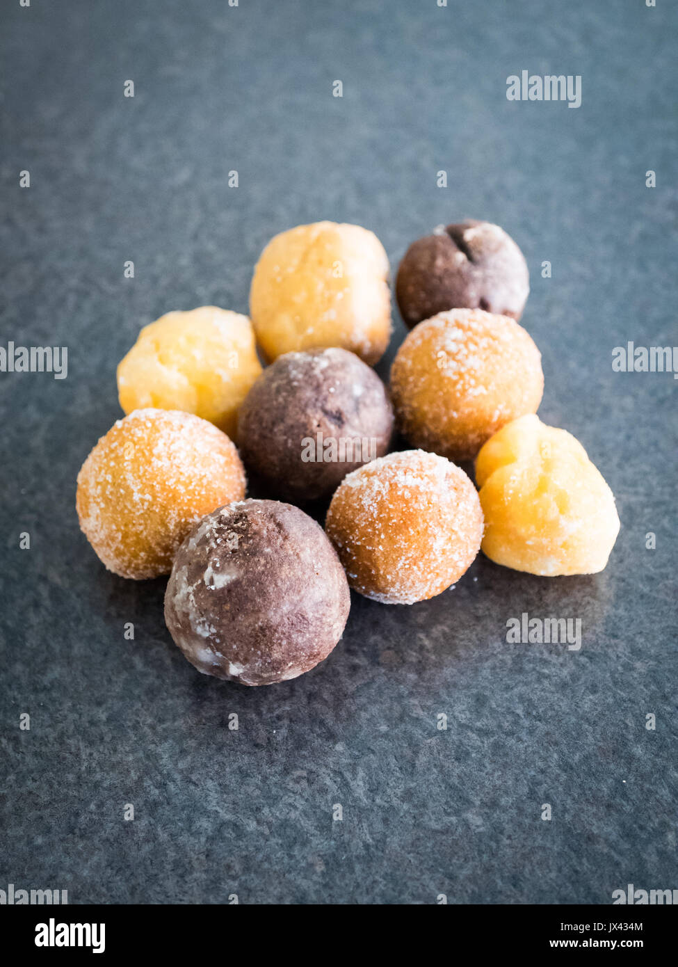 Timbits (donut holes, doughnut holes) from Tim Hortons, a popular Canadian fast food restaurant chain. Stock Photo