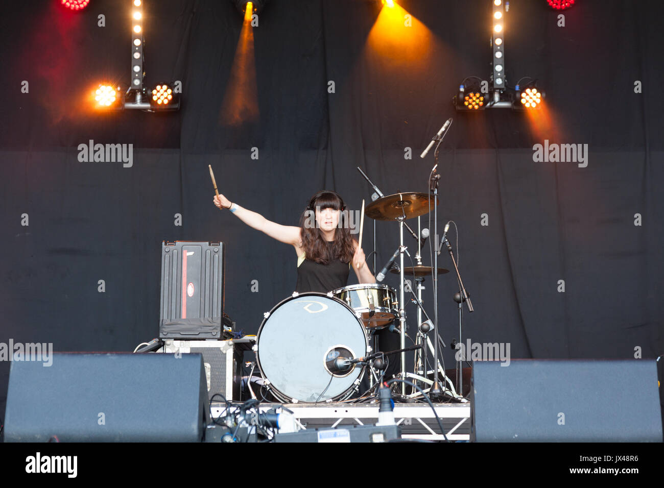 The drummer of the band 'The Whip' performs on the main stage  at the Cotton Clouds Festival, Greenfield,  Saddleworth,Oldham, UK Stock Photo