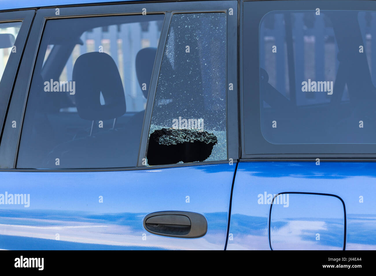 Shattered car window from vehicle burglary. Stock Photo