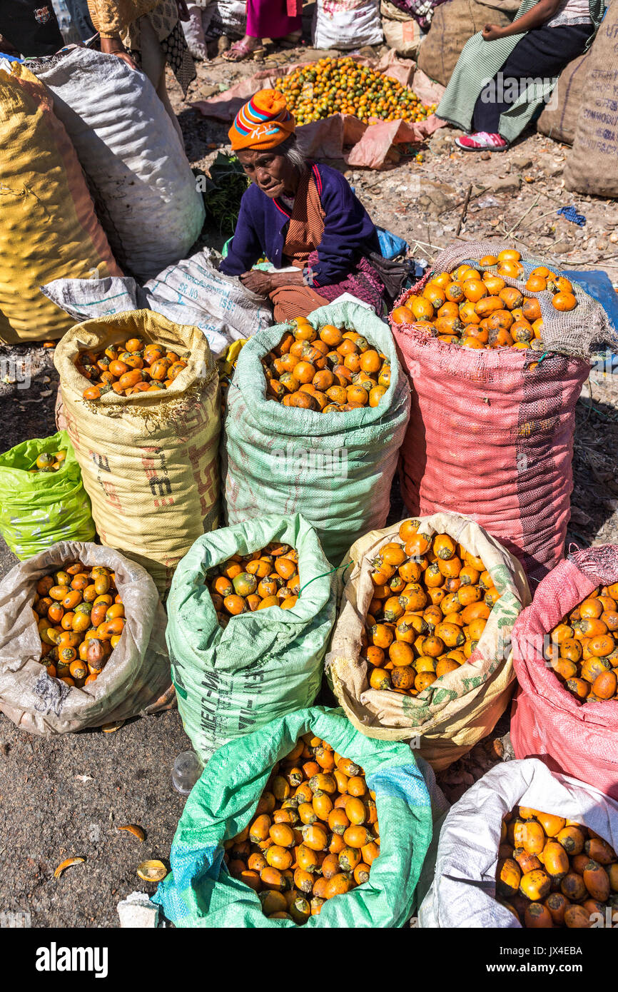 Woman selling fruit in outdoor market, Mawsynram, Meghalaya, India Stock Photo
