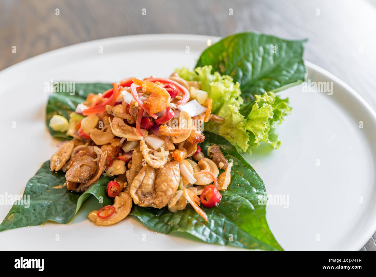 Crispy fish maw and dried shrimp in spicy salad Stock Photo Alamy