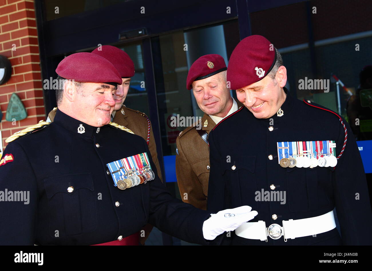 Soldiers wearing their distinctive Maroon Beret attend the wedding of one of their colleagues. Stock Photo