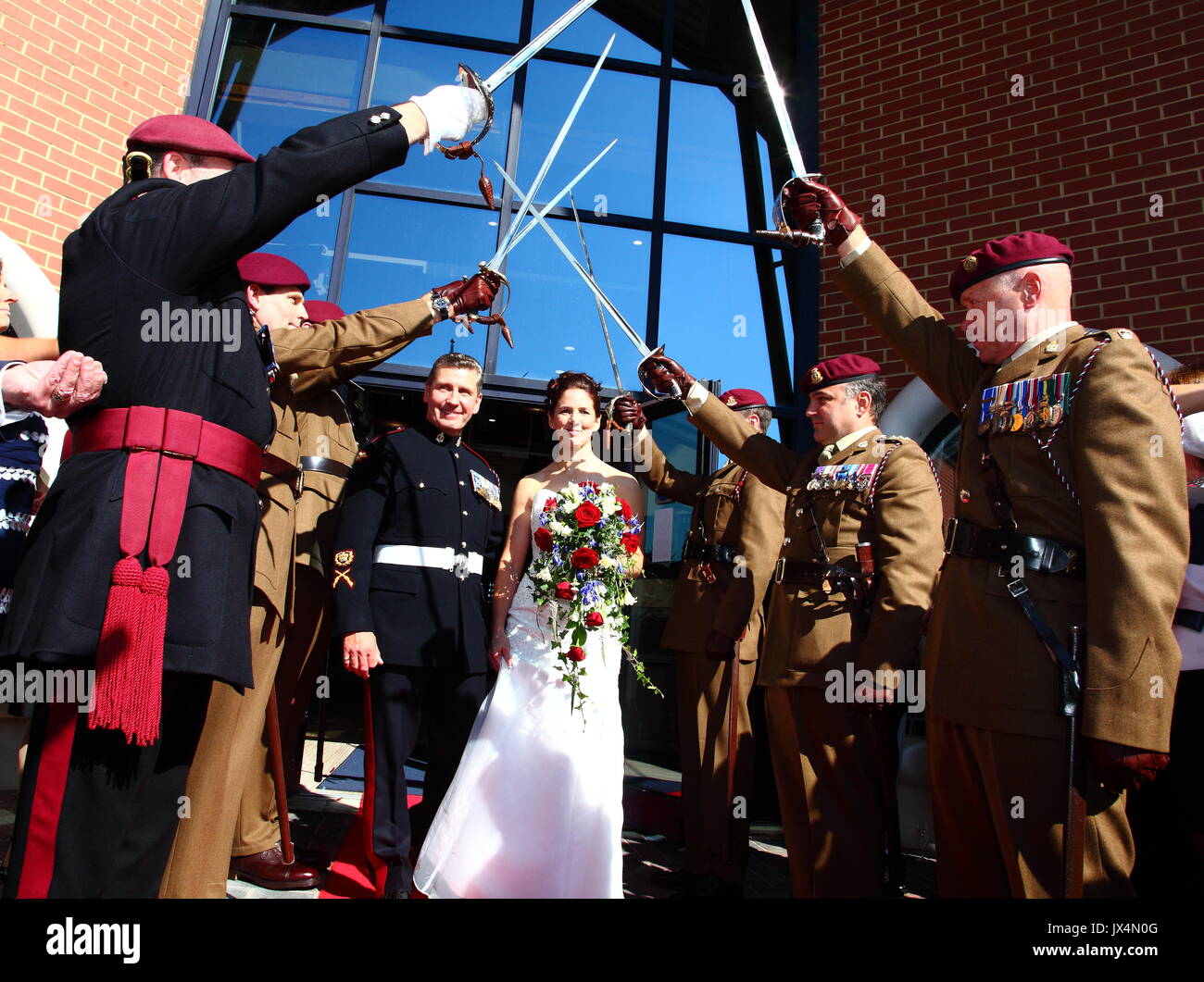 Soldiers wearing their distinctive Maroon Beret attend the wedding of one of their colleagues. Stock Photo