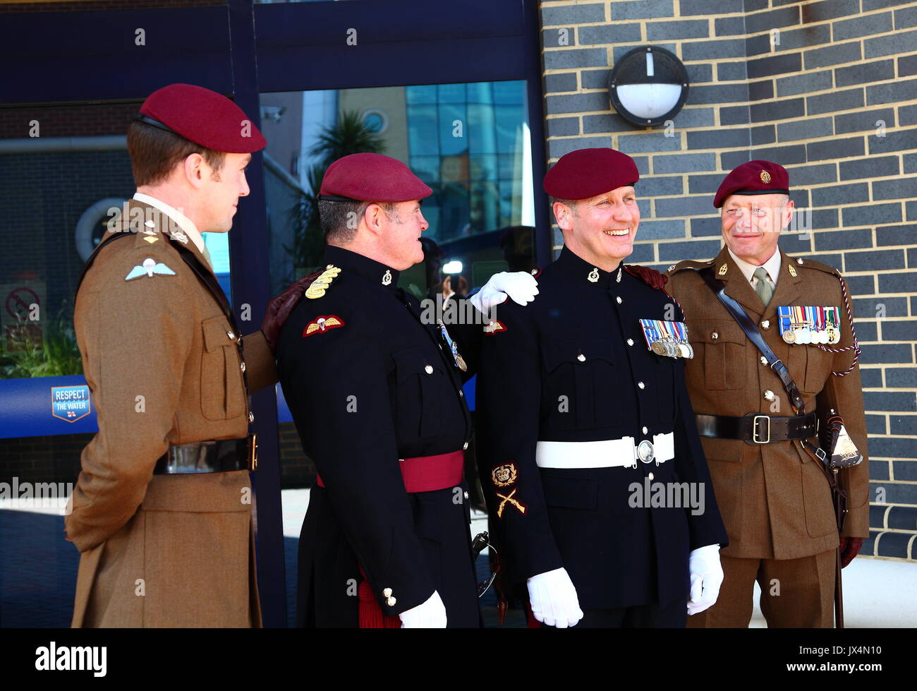 Soldiers wearing their distinctive Maroon Beret attend the wedding of one of their colleagues. Stock Photo