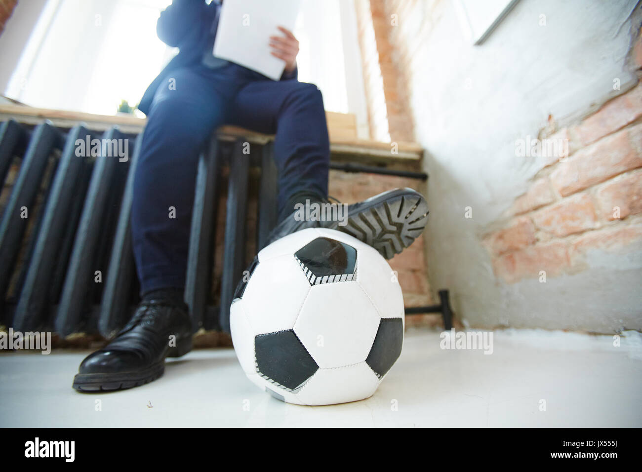 Ball on the floor Stock Photo - Alamy
