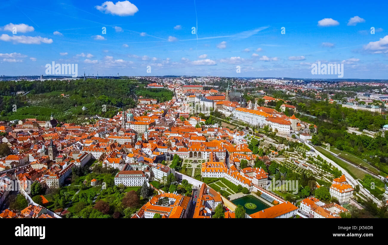 Flying Over Aerial View The City Of Prague feat. Historic Old Gothic Buildings In Czechia Czech Republic Stock Photo