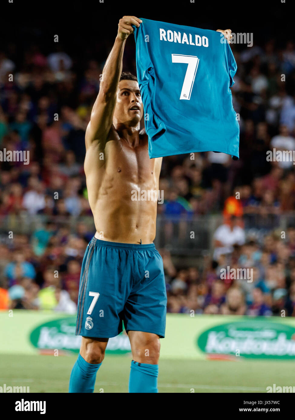 Camp Nou Stadium, Barcelona, Spain. 13th of August, 2017. Super Cup of  Spain between FC Barcelona and Real Madrid. Cristiano Ronaldo celebrating  his goal. Ronaldo shows his shirt to the public Credit:
