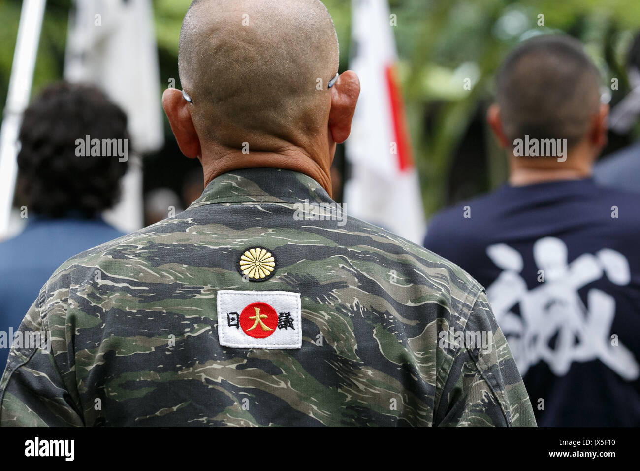 Tokyo, Japan. 15th Aug, 2017. Japanese nationalists dressed in military uniform visit Yasukuni Shrine to pay their respects to the war dead on the 72nd anniversary of Japan's surrender in World War II on August 15, 2017, Tokyo, Japan. Prime Minister Shinzo Abe was not among the lawmakers to visit the Shrine and instead sent a ritual offering to avoid angering neighboring countries who also associate Yasukuni with war criminals and Japan's imperial past. Credit: Rodrigo Reyes Marin/AFLO/Alamy Live News Stock Photo