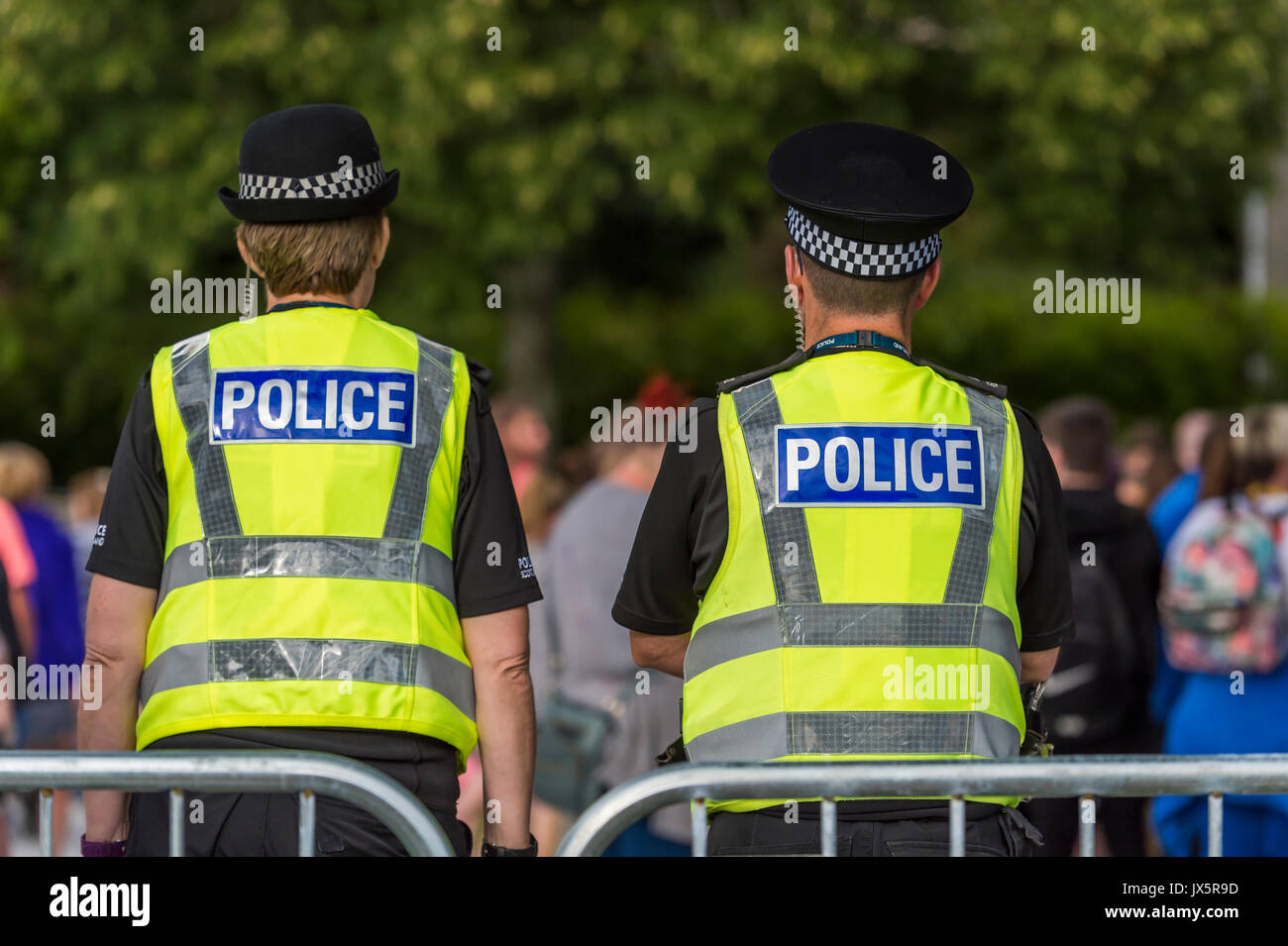 Dumfries, Scotland - August 12, 2017: Police Scotland officers on duty at a youth music festival. Stock Photo