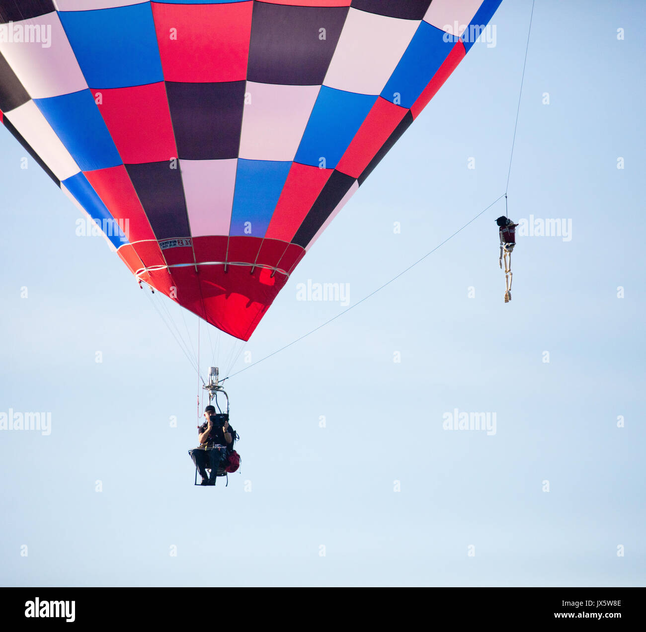 One man ballon and macabre skeleton crew - one of the balloons launched at dawn from Ashton Court park at the 39th Bristol Ballon Fiesta 2017 Stock Photo