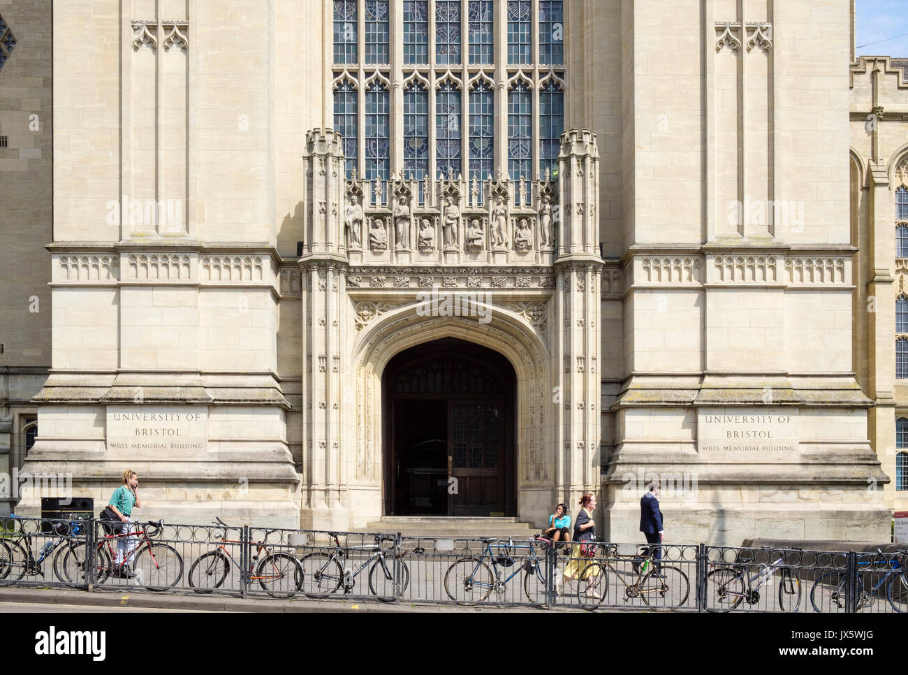 Student's bicycles on railings outside University of Bristol Wills Memorial Building entrance. Queens Rd, Bristol, Avon, England, UK, Britain Stock Photo