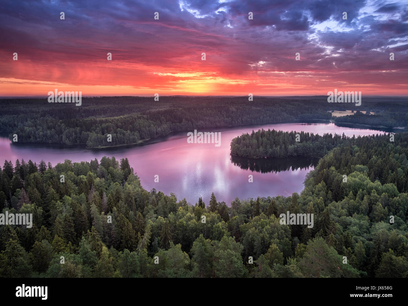 Scenic landscape with sunrise and lake at summer in national park Aulanko, Hämeenlinna, Finland Stock Photo