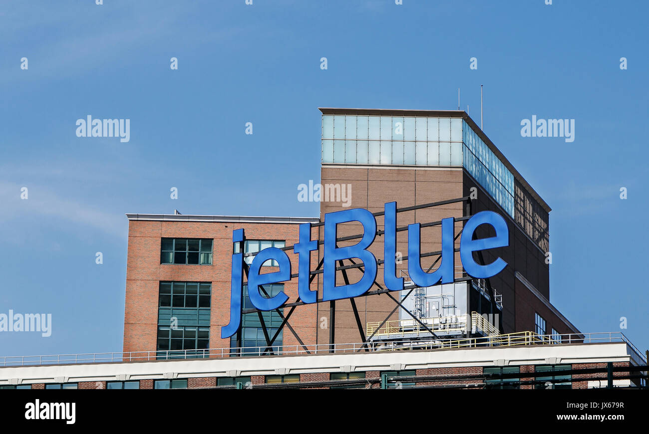 jetBlue advertisement is displayed at the top of a building. Stock Photo