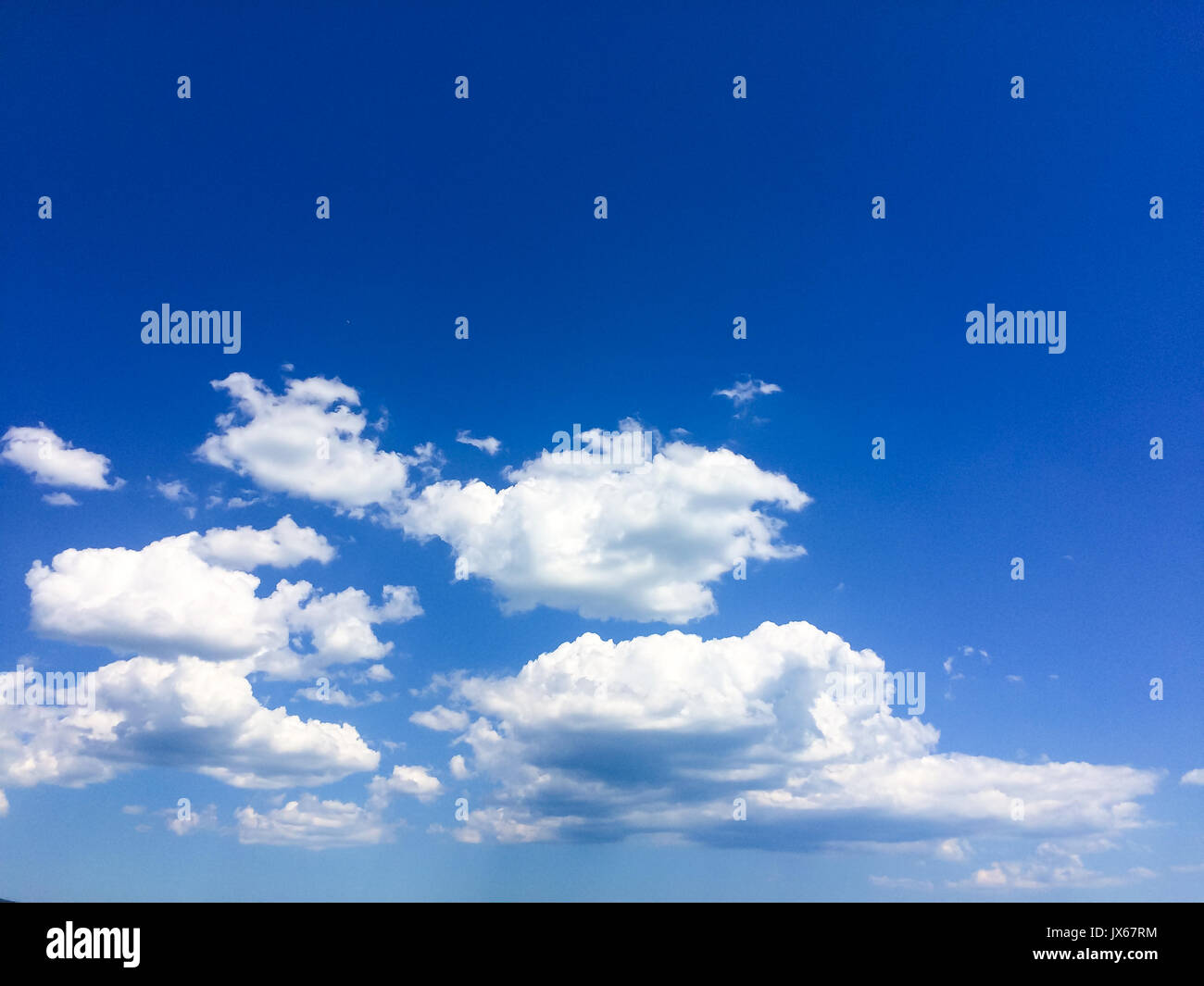Blue Summer Sky with White Clouds Background Stock Photo - Alamy