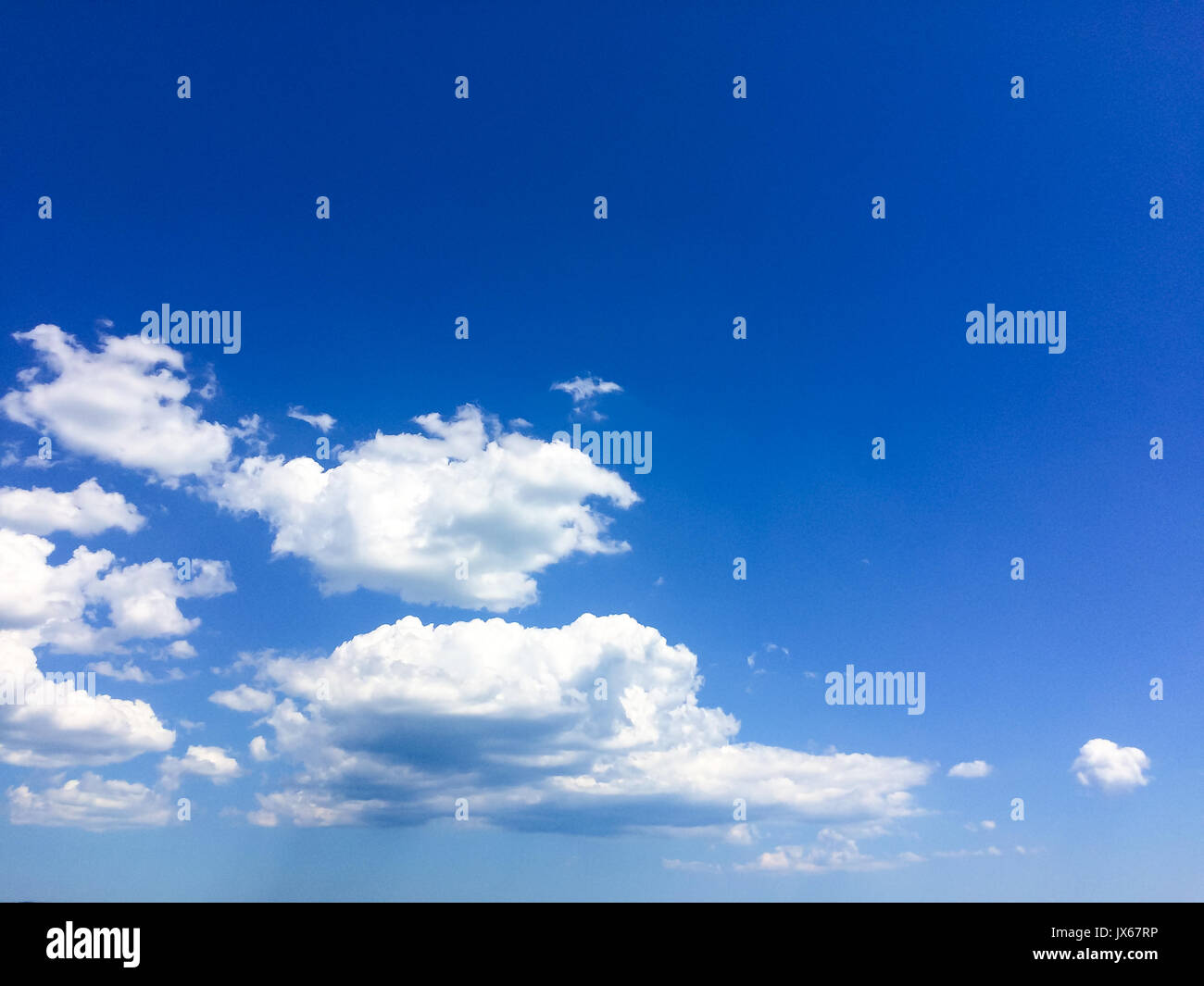 Blue Summer Sky with White Clouds Background Stock Photo - Alamy