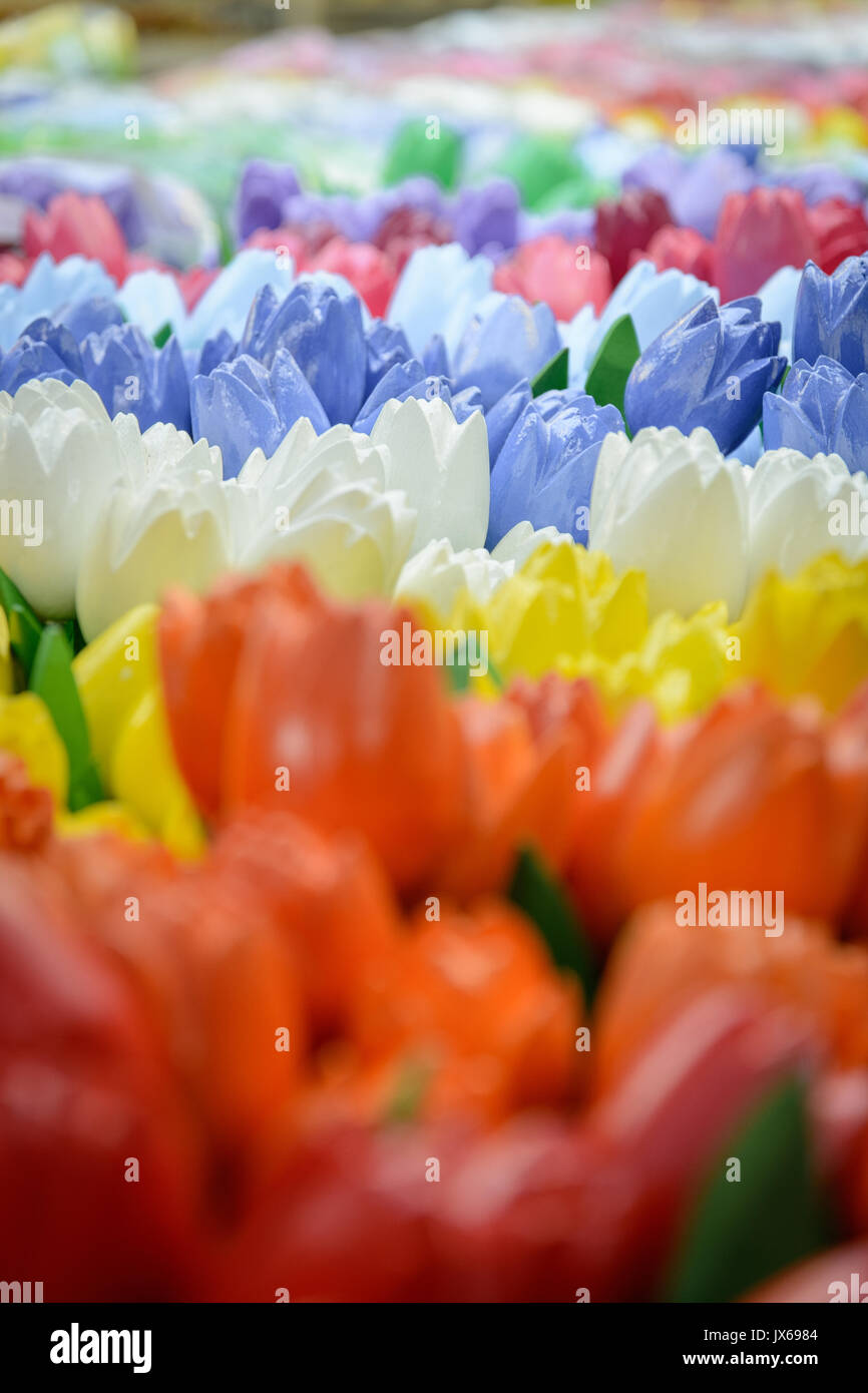 Colorful wooden tulips in Bloemenmarkt in Amsterdam. Portrait format. Stock Photo