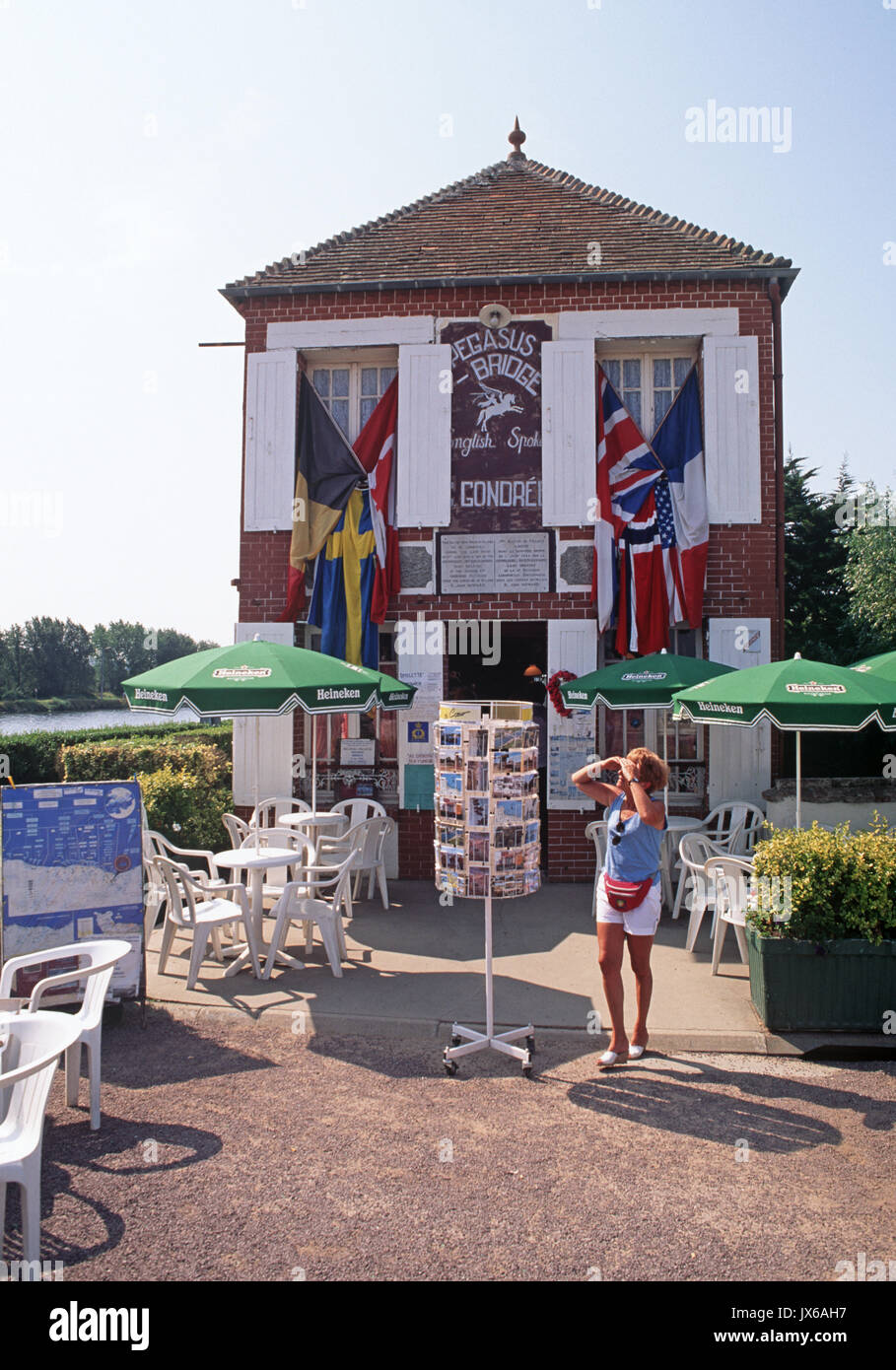 Madame Gondree of the Pegasus Cafe, next to the Pegasus Bridge where there was fierce fighting by the British to keep the bridge open during the first days of the 6th of June Allied landings, Stock Photo