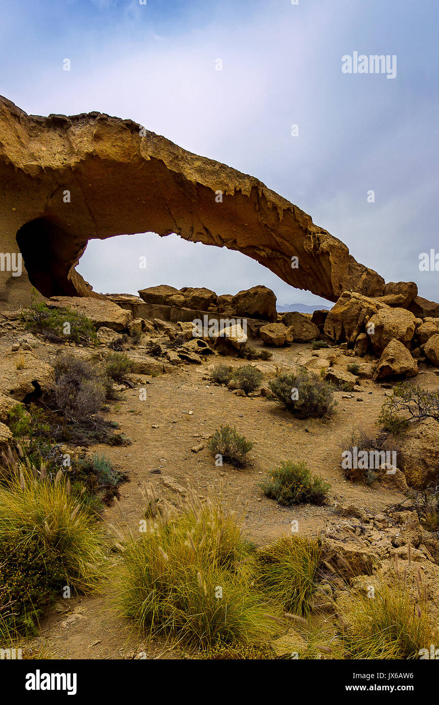 This stone arch is called Arco de Tajao. You can find it on the Canary island Tenerife in Spain Stock Photo