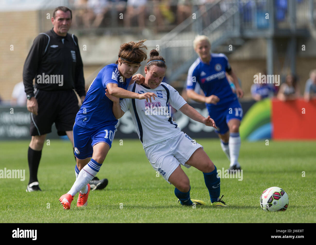Ji So-yun of Chelsea Ladies wins a free kick for Remi Allen of Birmingham City Ladies challenge during the FAWSL match between Chelsea Ladies and Birm Stock Photo